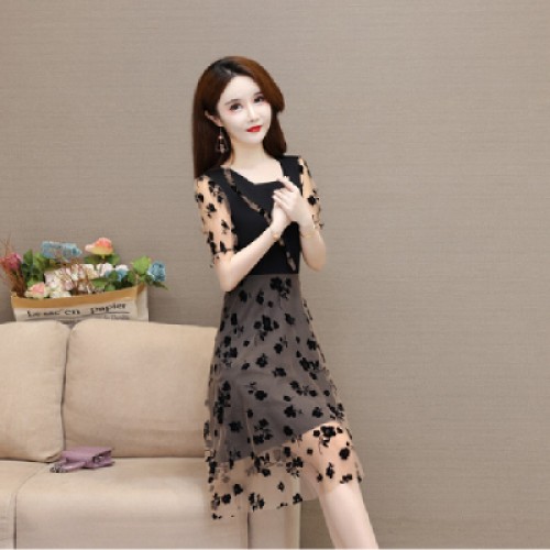 Chic Black Dress with Delicate Floral Patterns and Sheer Overlay |image