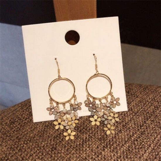 A pair of long, silver dangle earrings with sparkling crystals and dangling fairy charms. Super Fairy Long Shiny Korean Version Earrings-Gold |image