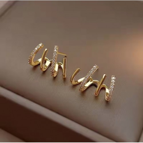 Claw Your Way to Style Glamorous Gold Stud Earrings |image