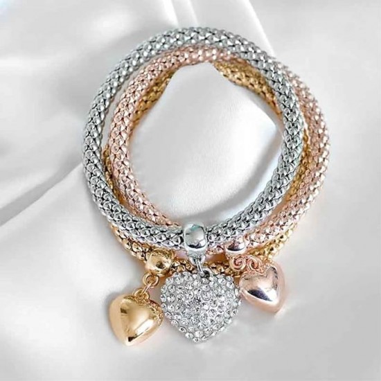 Three gold, silver, and rose gold tone chain bracelets with crystal heart, crown, and charm embellishments. Gorgeous Heart Charm set of 3 Bracelets in Gold, Rose & Silver |image