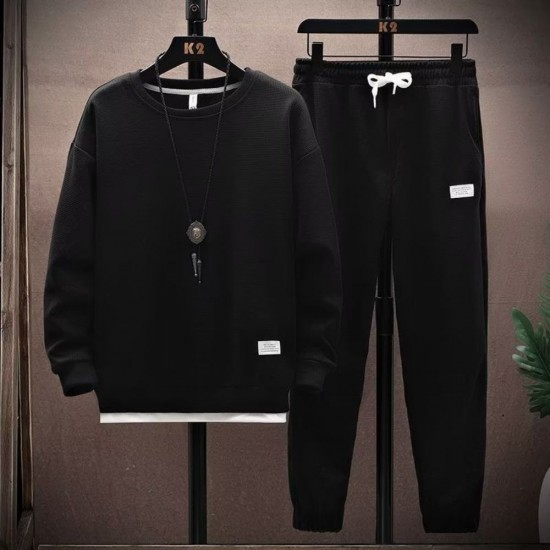 Men's waffle knit tracksuit displayed on a hanger. The tracksuit consists of a waffle knit jacket and matching waffle knit joggers. Men's Waffle Tracksuit For Spring & Autumn (2Pcs) Black |image