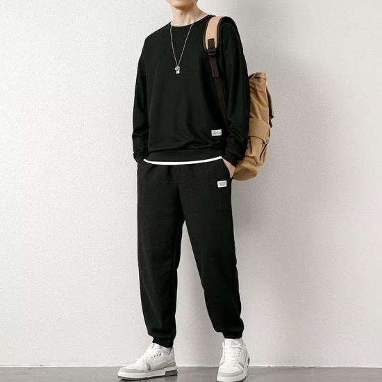 Men's waffle knit tracksuit displayed on a hanger. The tracksuit consists of a waffle knit jacket and matching waffle knit joggers. Men's Waffle Tracksuit For Spring & Autumn (2Pcs) Black |image