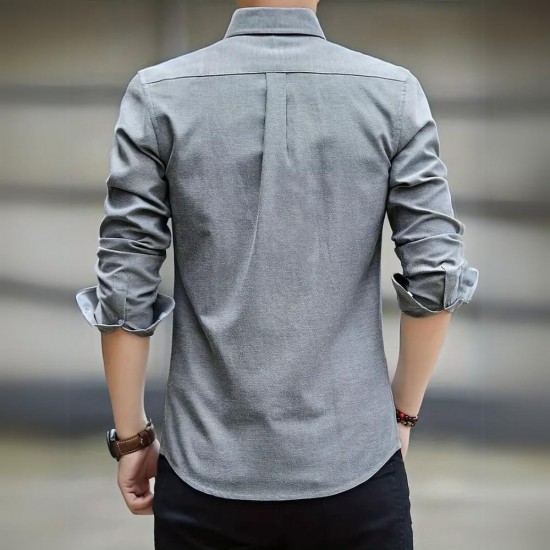 Male model wearing a lightweight, long-sleeve oxford shirt in a casual setting Men's Long Sleeved Casual Thin Oxford Shirt - Grey |image