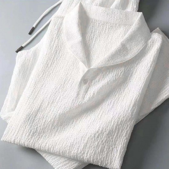 Men's summer suit with a loose-fitting short sleeve shirt and pants, modeled on a man. New Men's Fashion Classic Shirt Trousers Set - White |image