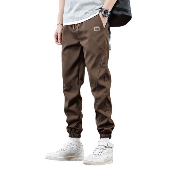 Men modeling Brown spring cargo pants in a casual and comfortable pose Men's Spring Ready Brown Cargo Pants in Breathable Cotton |image