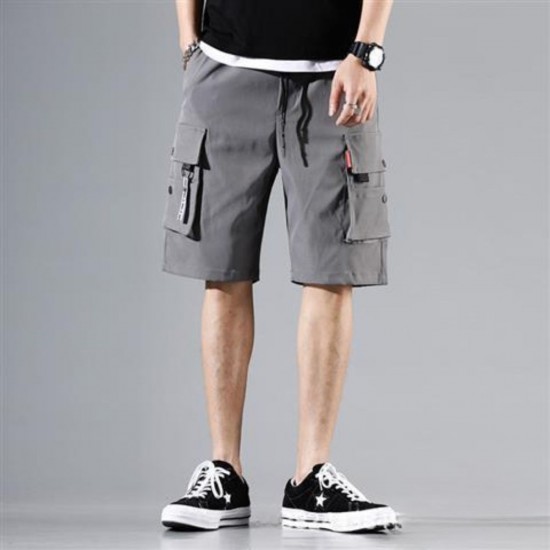 Male model wearing trendy cargo shorts with multiple pockets, showcasing a stylish and functional summer outfit. Men's Trendy Cargo Shorts With Multi Pocket - Grey |image