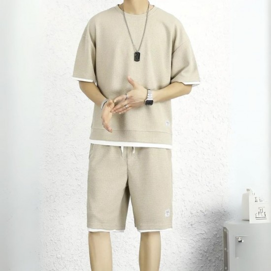 Male model wearing a men's waffle knit sports set, showcasing a comfortable and stylish outfit. Men's Waffle Knit Tracksuit Set Relaxed Summer Style - Biege |image