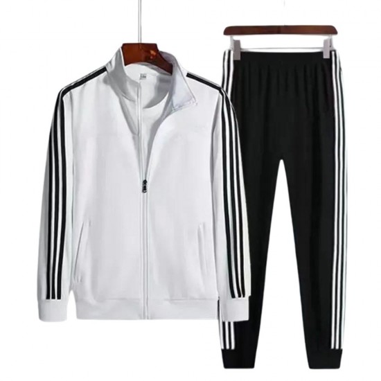 Male model wearing a White tracksuit with white stripes on the sleeves and legs. Men's White Tracksuit with Black Stripes Sporty & Stylish |image